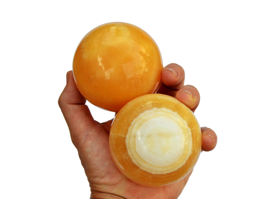 Orange calcite ball (65mm - 85mm) 