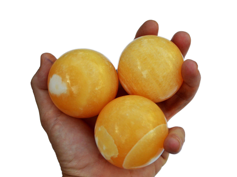 Orangefarbene Calcitkugel – (55 mm – 65 mm) 