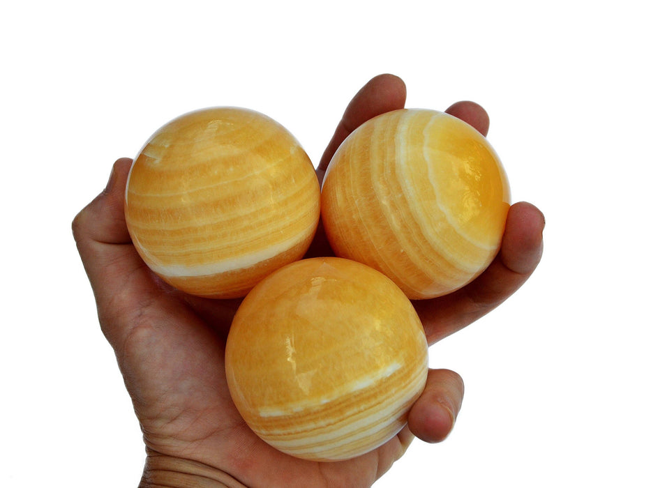 Orange calcite ball - (55mm - 65mm) 