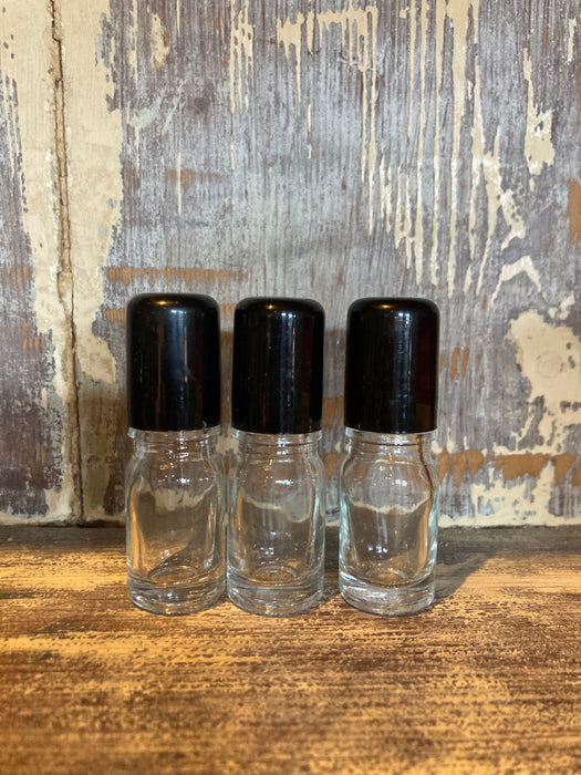 Lasinen Kirikas Roll On Pullo mustalla korkilla