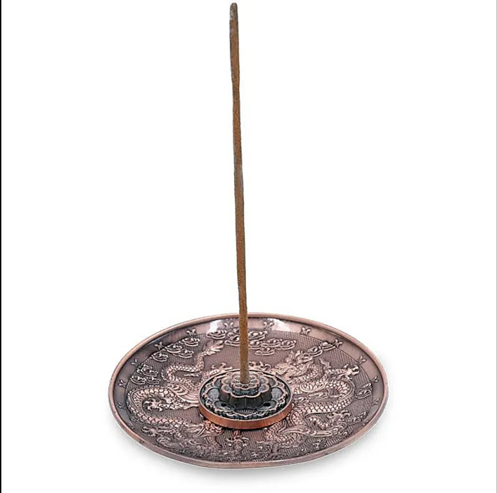 Copper colored dragon incense pot