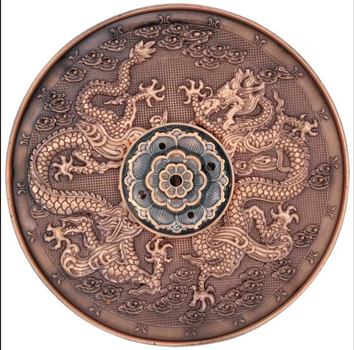 Copper colored dragon incense pot