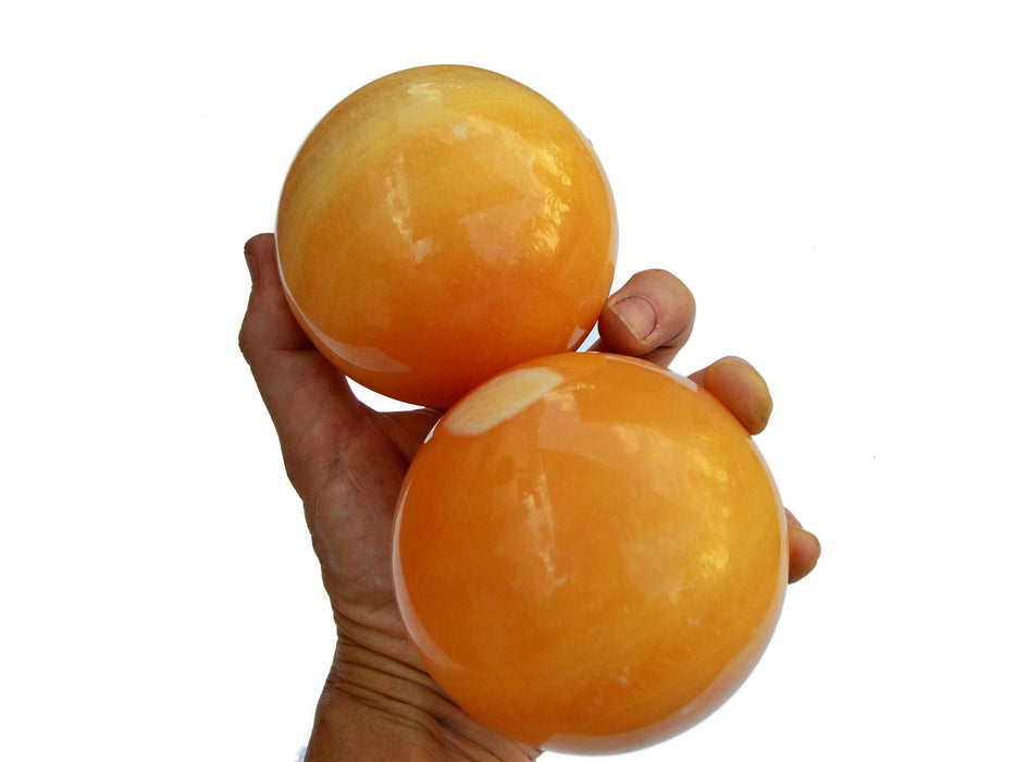 Orange calcite ball (65mm - 85mm) 