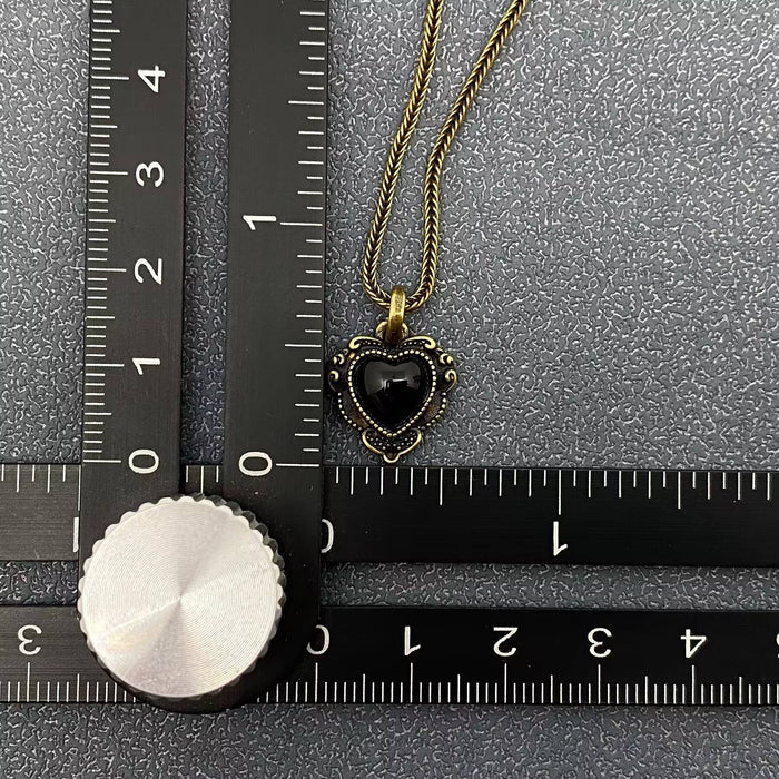 Vintage Inlaid Black Agate Heart Charm Bronze Necklace -kaulakoru